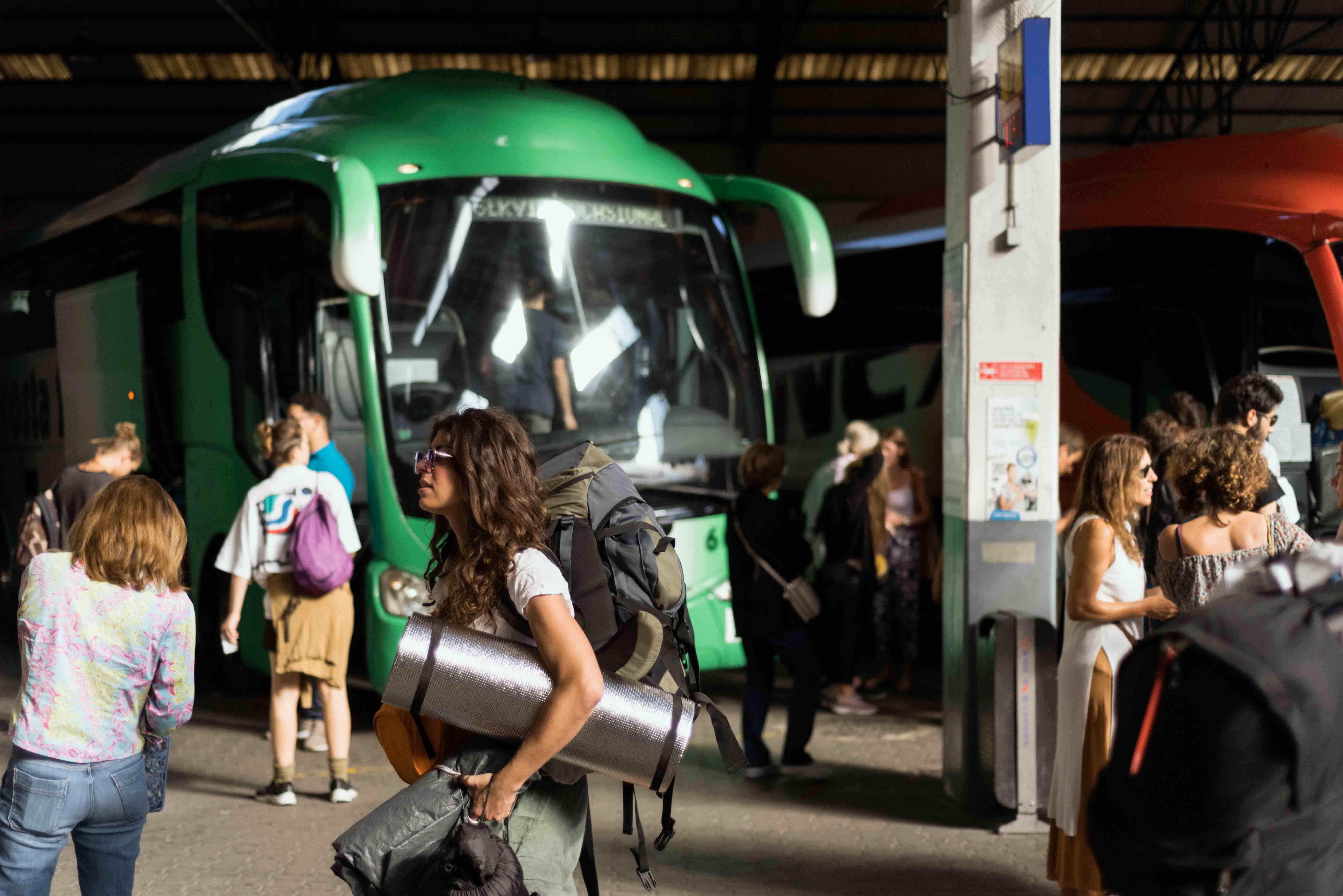 Busbud Bus and Train station with passengers
